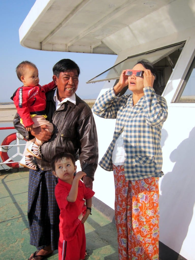 Burmese family watching the solar eclipse Burmese family watching the solar eclipse