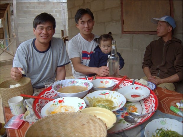 Eating dinner with the village chief in Northern Laos