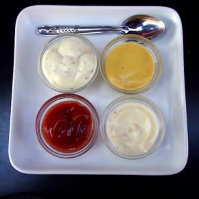 Table condiments at a street stall in Marrakesh, Morocco