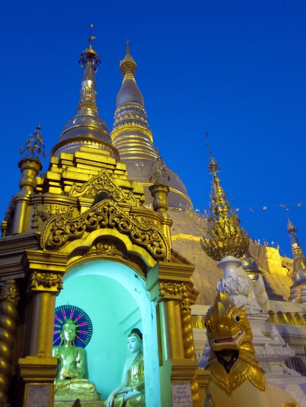 Buddha at dusk in Shwedagon Pagoda in Yangon, Myanmar