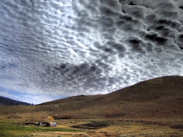 Cottonball clouds on the long drive from Fez to Zaita and into the Sahara